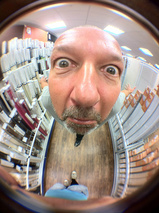 iPhone fisheye lens - self portrait 1/17 sec | f/2.8 | 3.9 mm | ISO 80<br /><a target="_blank" xhref="http://www.magezinepublishing.com/equipment/images/equipment/190-degree-Fisheye-lens-for-iPhone-3623/highres/fisheyepete1_1317908123.jpg">High-Res</a>