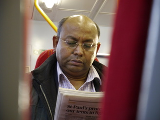 Candid on train - 1/20 sec | f/5.6 | 42.0 mm | ISO 800<br /><a target="_blank" xhref="http://www.magezinepublishing.com/equipment/images/equipment/Lumix-G-X-Vario-PZ-1442mm-f3556-3581/highres/epzvarioX8_1321613287.jpg">High-Res</a>